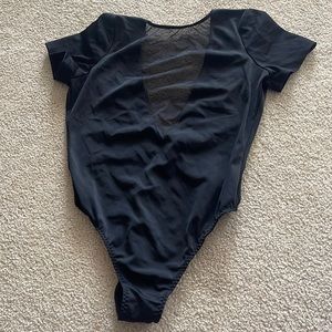 Garage bodysuit with mesh chest cutout